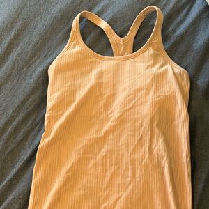 Pink lululemon ebb to street tank top